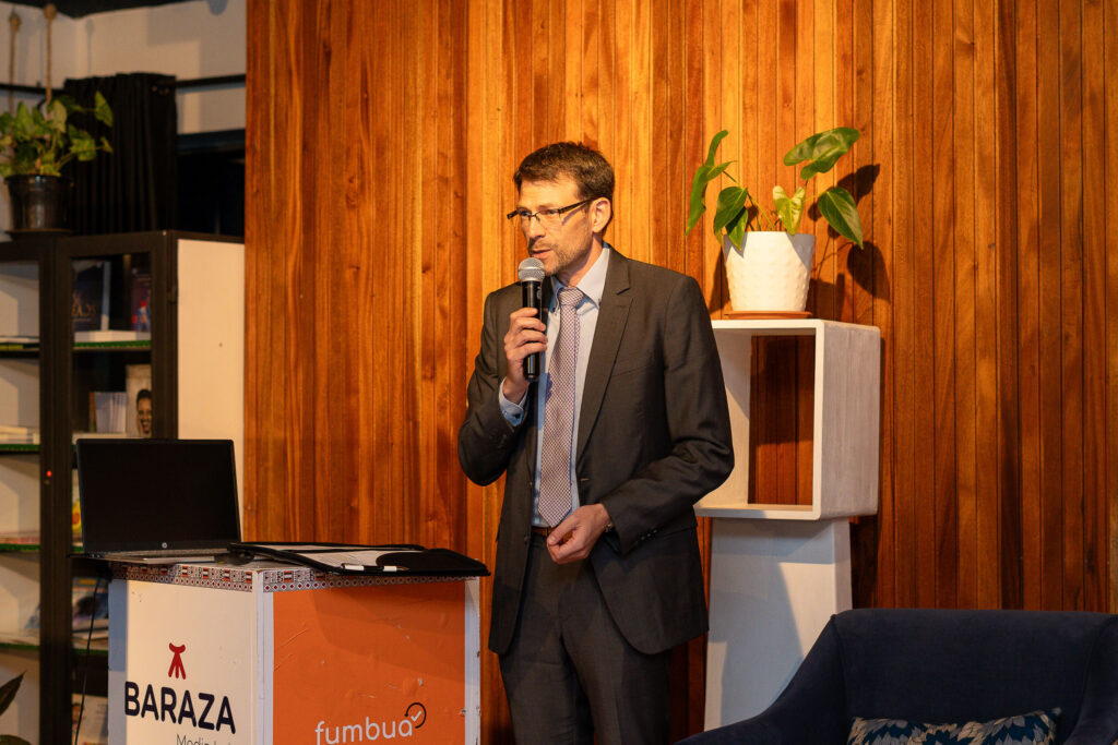 Speaker addressing guests at a Baraza Media Lab event